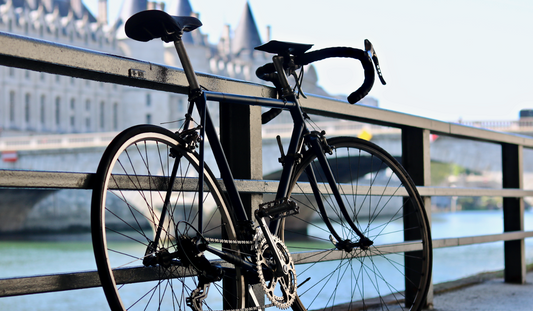 What initiatives are cities taking to encourage bicycle travel?