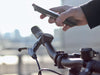 Shapeheart's smartphone mount for bikes (and scooters) allows you to attach your smartphone to your handlebar in seconds and let your GPS guide you. No need to take your smartphone out of your pants pocket to find your way.
